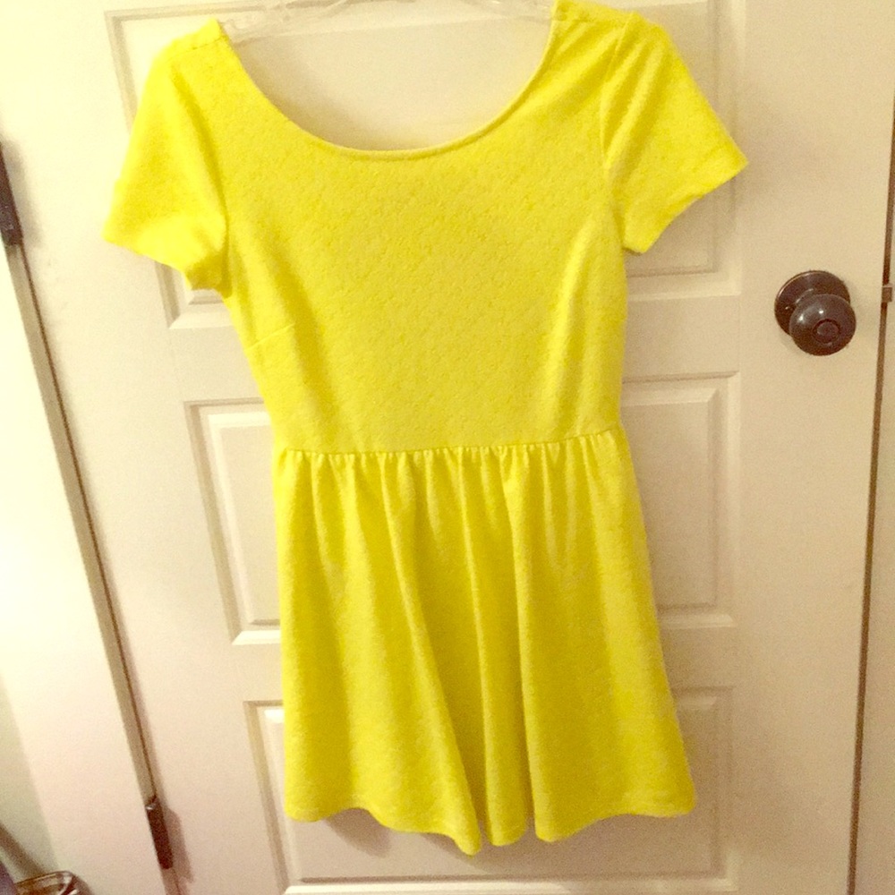 Beautiful bright yellow dress with a cut out back